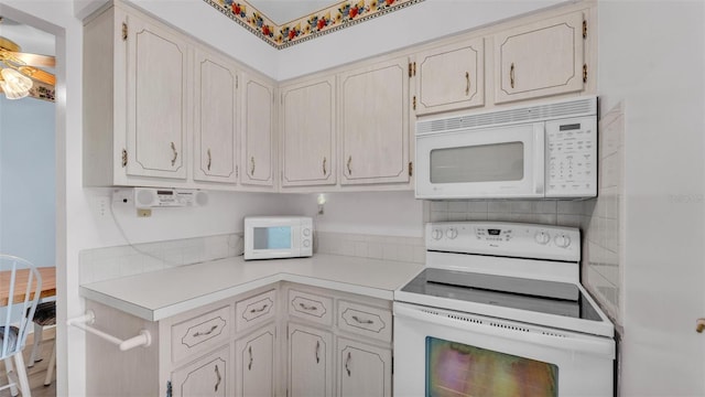 1600 W Lake Parker Dr Unit A2, Lakeland, FL 33805 - kitchen with white appliances and light countertops