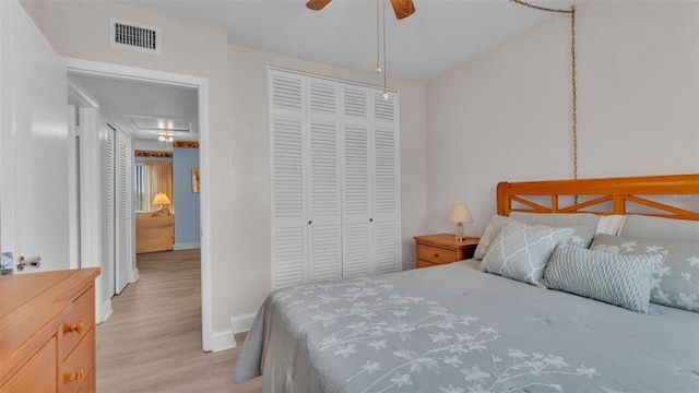 1600 W Lake Parker Dr Unit A2, Lakeland, FL 33805 - bedroom featuring a ceiling fan, a closet, light wood-type flooring, visible vents, and baseboards