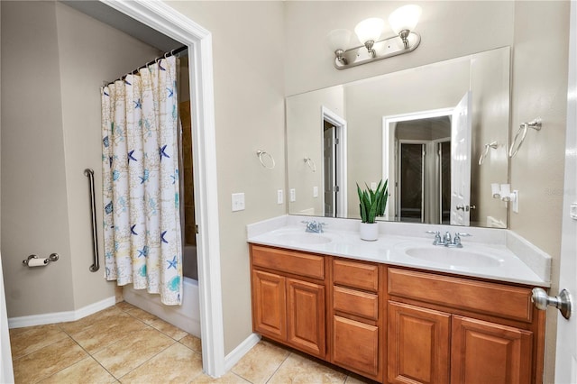 bathroom with tile patterned flooring, vanity, and shower / tub combo with curtain