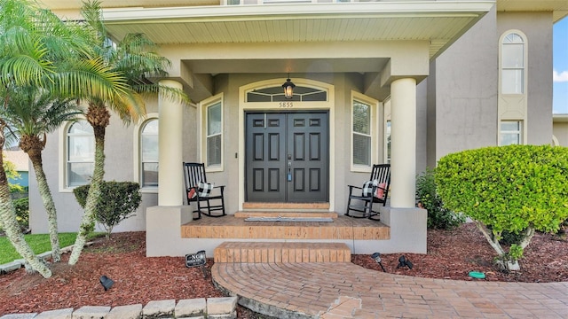 entrance to property with a porch