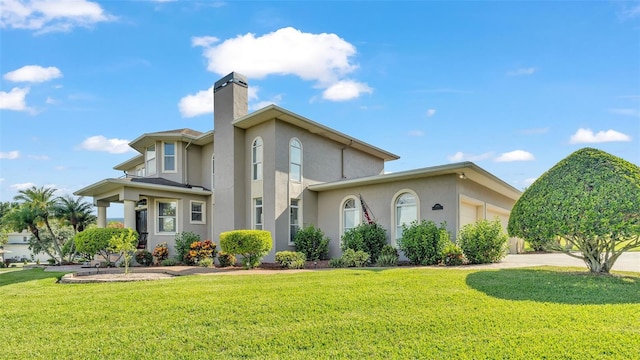 view of front of home with a front lawn