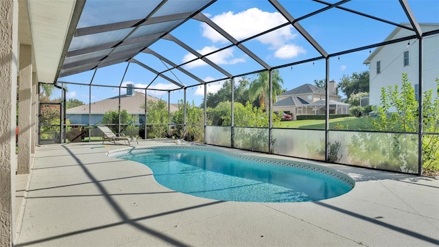 view of pool featuring a lanai and a patio area