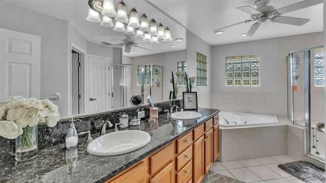 bathroom with vanity, separate shower and tub, tile patterned floors, and ceiling fan