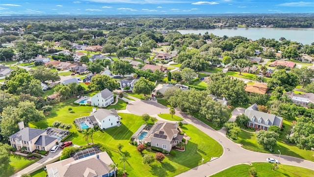 bird's eye view with a water view