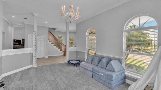 carpeted living room with crown molding and an inviting chandelier