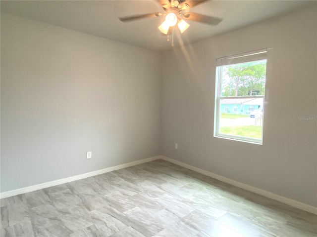 empty room featuring ceiling fan