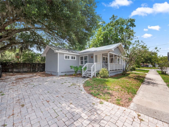 view of front of home featuring covered porch