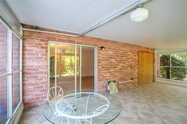 sunroom / solarium with a healthy amount of sunlight