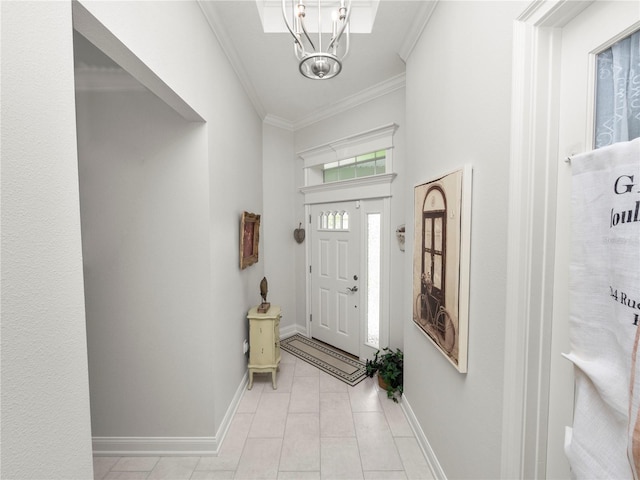 entryway featuring an inviting chandelier and crown molding