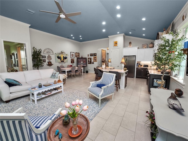 living room with high vaulted ceiling, crown molding, ceiling fan, and light tile patterned flooring