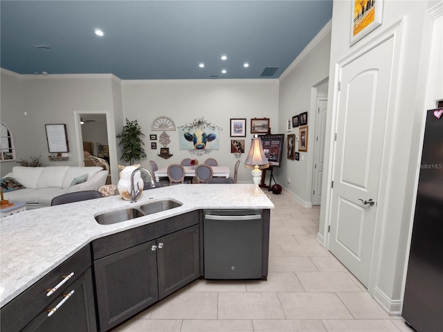 kitchen with light tile patterned floors, black fridge, dishwasher, crown molding, and sink