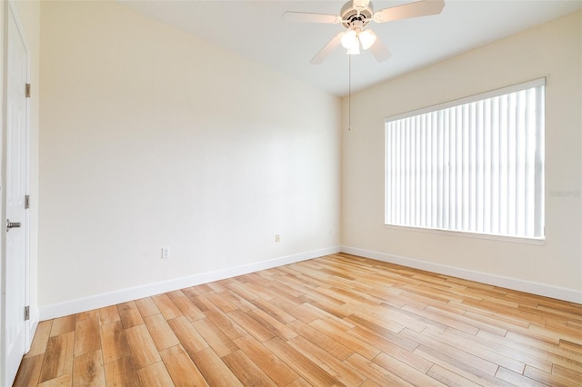 unfurnished room with ceiling fan and light hardwood / wood-style floors