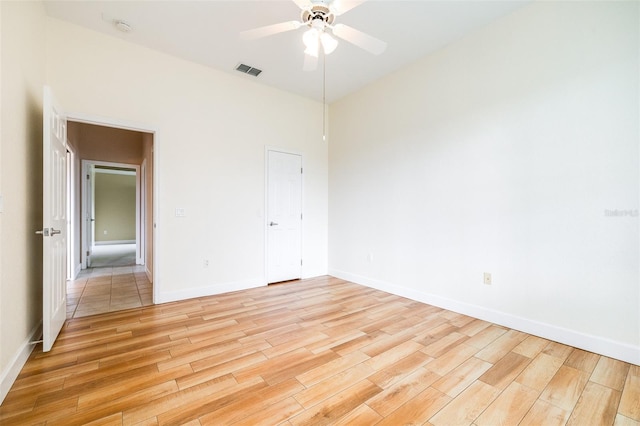 unfurnished room with light hardwood / wood-style floors and ceiling fan