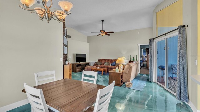 dining room with ceiling fan with notable chandelier and vaulted ceiling