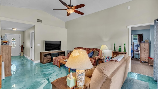 living room featuring ceiling fan and lofted ceiling