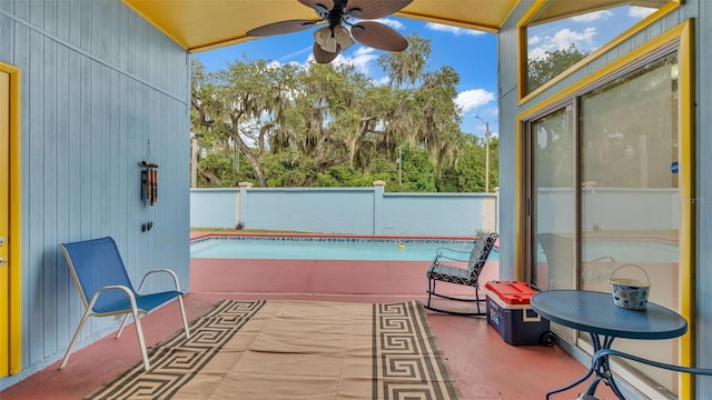 view of patio featuring a fenced in pool