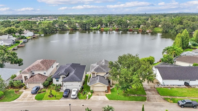 birds eye view of property featuring a water view