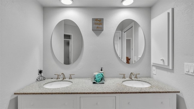 bathroom featuring double sink vanity