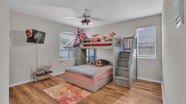 bedroom featuring ceiling fan and light wood-type flooring