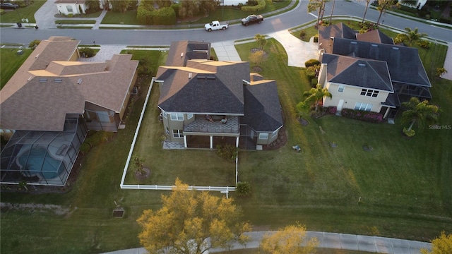 birds eye view of property with a residential view