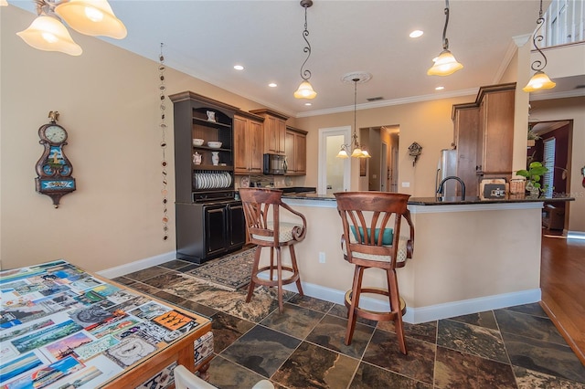 kitchen with brown cabinetry, baseboards, open shelves, black microwave, and decorative light fixtures