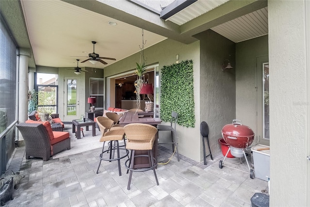 view of patio / terrace featuring a ceiling fan