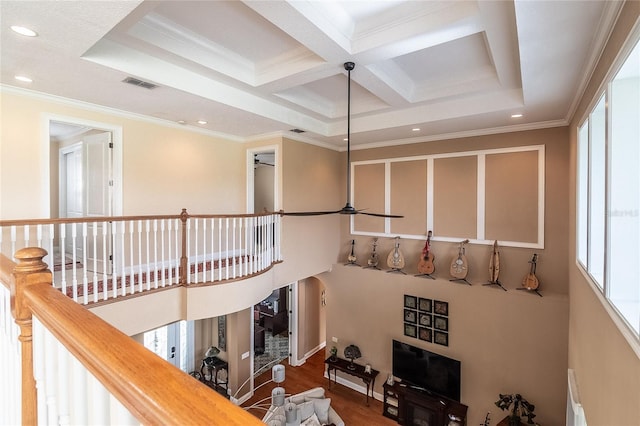 stairway featuring visible vents, a ceiling fan, coffered ceiling, recessed lighting, and crown molding