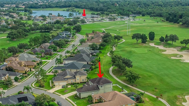 bird's eye view featuring a residential view, a water view, and view of golf course