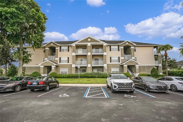 4255 Summer Landing Dr Unit 106, Lakeland, FL 33810 - view of building exterior with uncovered parking