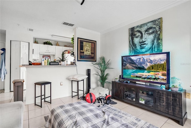 4255 Summer Landing Dr Unit 106, Lakeland, FL 33810 - living room featuring crown molding, light tile patterned floors, and visible vents