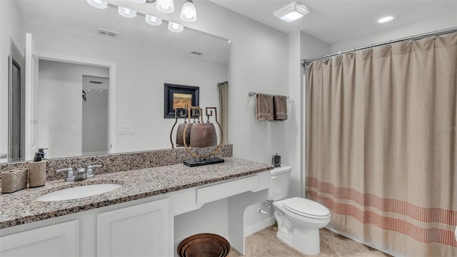 full bathroom with visible vents, vanity, toilet, and tile patterned floors