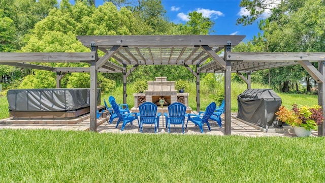 view of patio with an outdoor stone fireplace, a pergola, and area for grilling