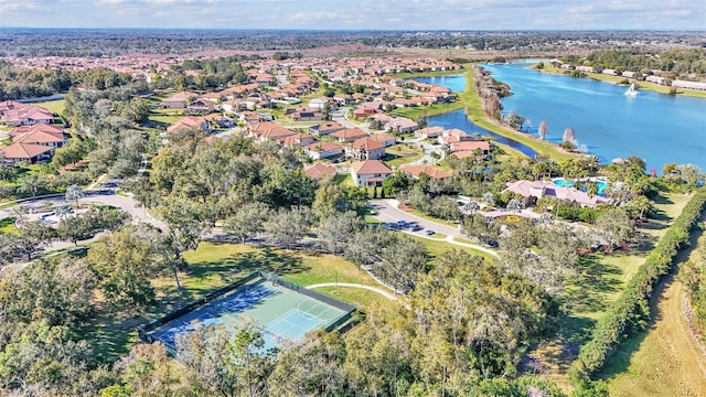 drone / aerial view featuring a water view and a residential view