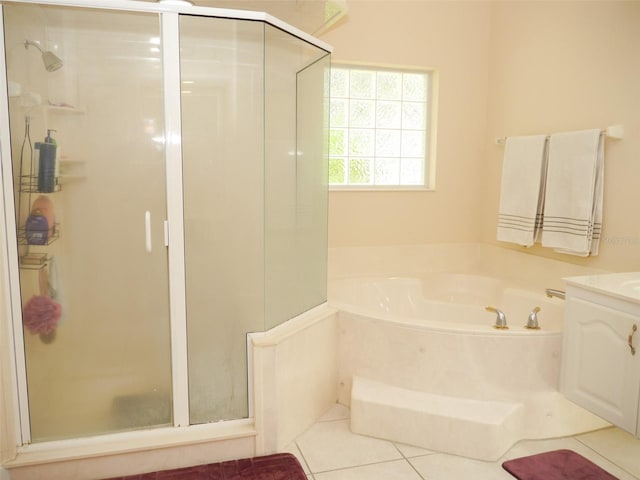 bathroom with vanity, separate shower and tub, and tile patterned floors