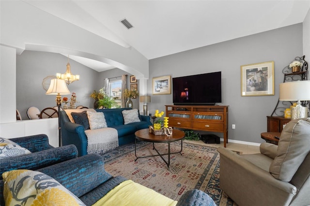 carpeted living room with an inviting chandelier and lofted ceiling