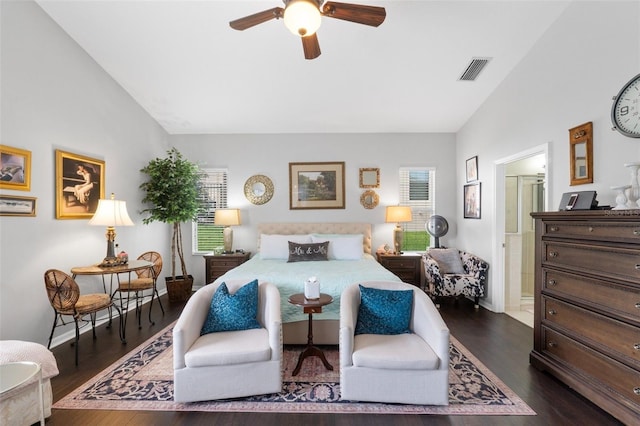 bedroom featuring ceiling fan, dark wood-type flooring, and lofted ceiling