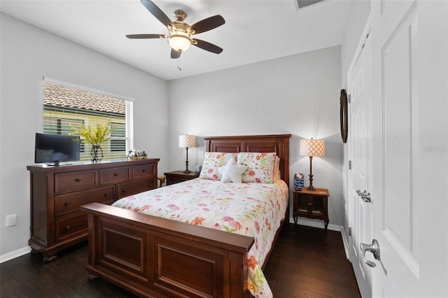 bedroom featuring dark wood-type flooring and ceiling fan