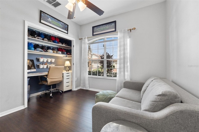 home office featuring ceiling fan and dark hardwood / wood-style flooring