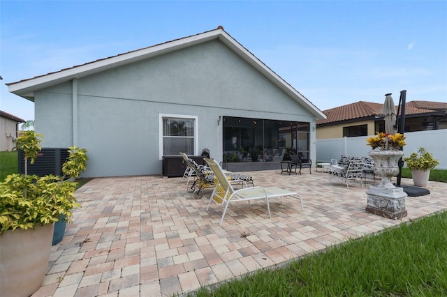 rear view of house with a patio area