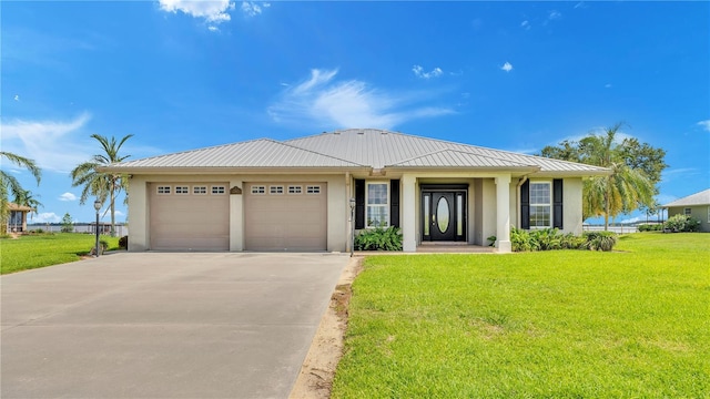7884 N Lake Buffum Shores Rd, Fort Meade, FL 33841 - view of front facade with a garage and a front lawn