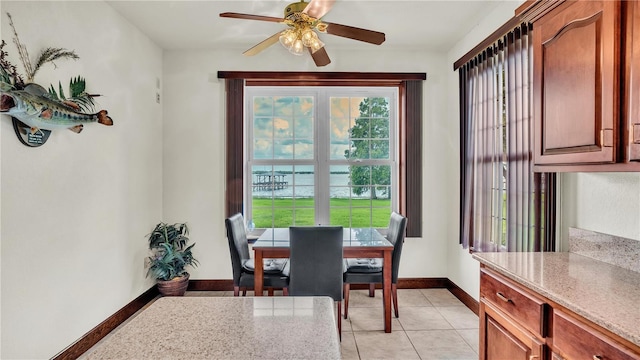 7884 N Lake Buffum Shores Rd, Fort Meade, FL 33841 - tiled dining space featuring ceiling fan