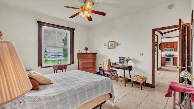 7884 N Lake Buffum Shores Rd, Fort Meade, FL 33841 - bedroom with light tile patterned floors and ceiling fan