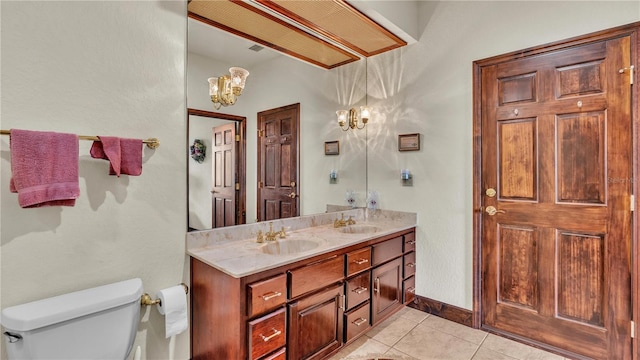 7884 N Lake Buffum Shores Rd, Fort Meade, FL 33841 - bathroom featuring toilet, an inviting chandelier, tile patterned flooring, and dual bowl vanity