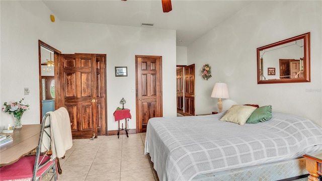 7884 N Lake Buffum Shores Rd, Fort Meade, FL 33841 - bedroom with light tile patterned floors and ceiling fan