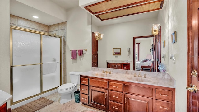 7884 N Lake Buffum Shores Rd, Fort Meade, FL 33841 - bathroom with walk in shower, dual vanity, tile patterned floors, and toilet