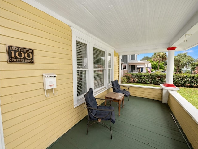 wooden deck with a porch