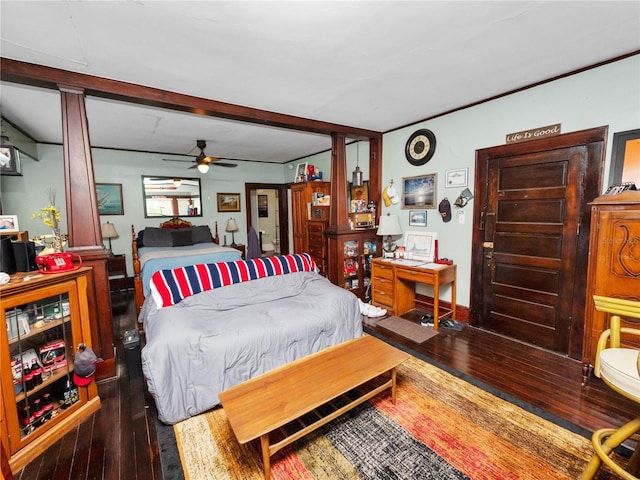 bedroom with ceiling fan and dark hardwood / wood-style flooring