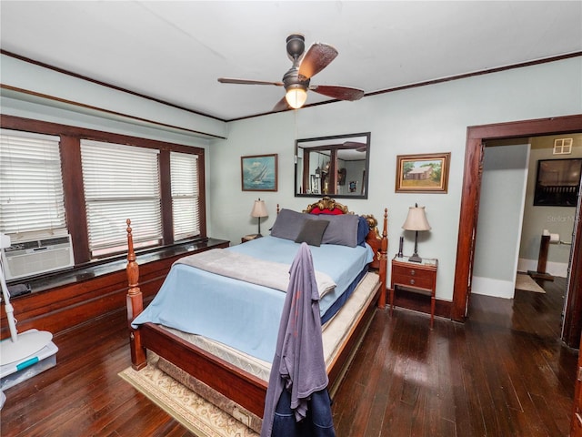 bedroom with ornamental molding, dark hardwood / wood-style floors, cooling unit, and ceiling fan