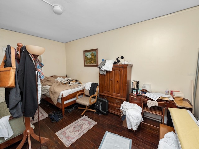 bedroom featuring dark wood-type flooring