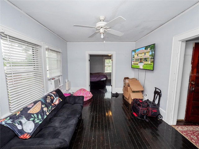 living room featuring ceiling fan, cooling unit, and dark hardwood / wood-style flooring